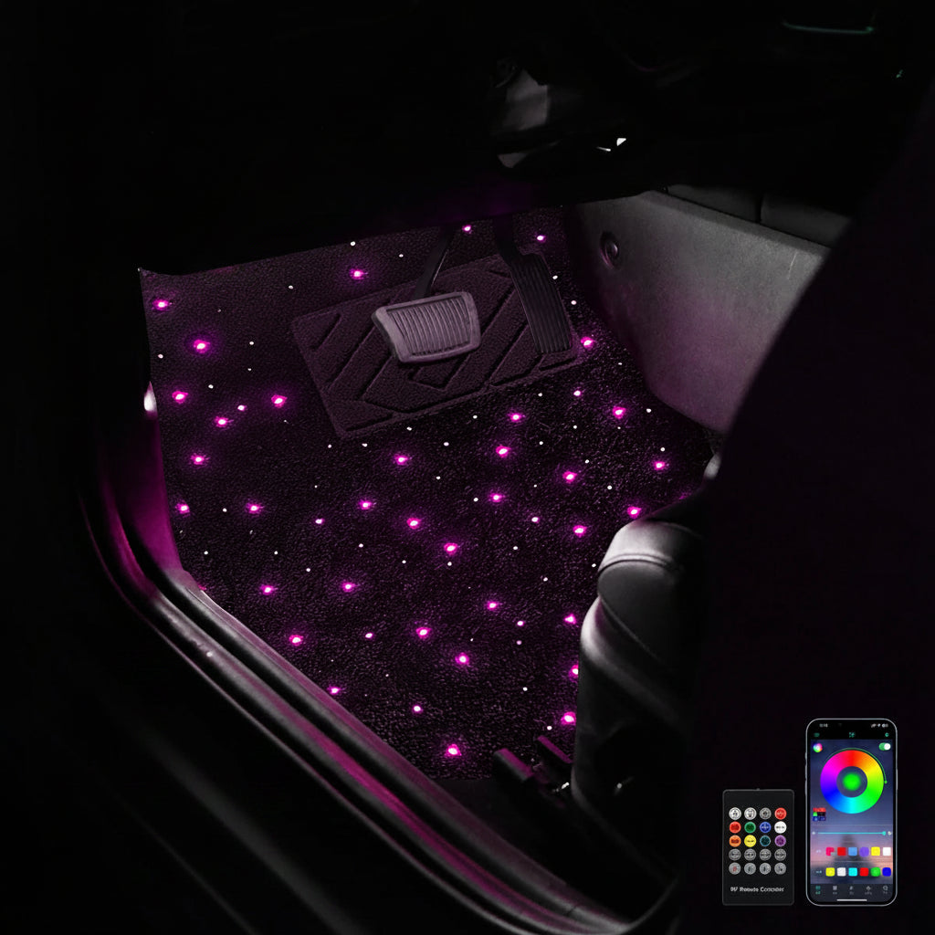 Car floor mats with purple LED lighting and remote control on a dark background