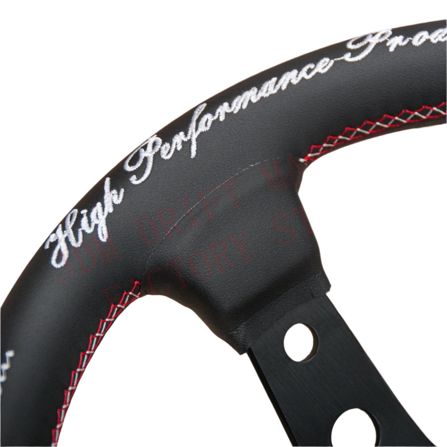 Black steering wheel with red stitching on a white background