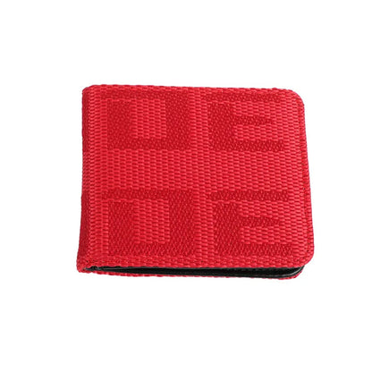 A red woven bifold wallet with a tonal geometric pattern, shown on a plain white background.