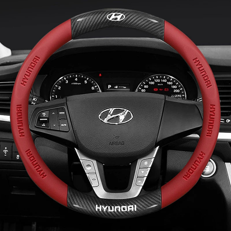 Hyundai steering wheel with red cover and visible logo