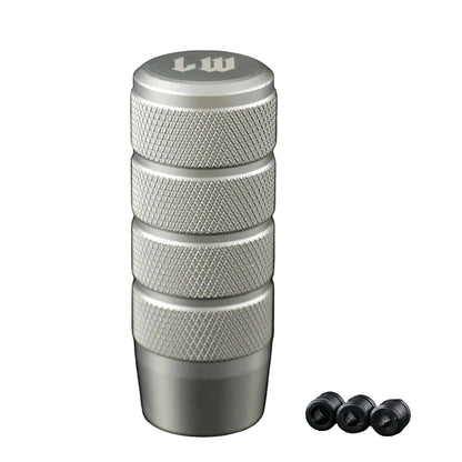 Stack of metallic cylindrical objects with textured surface and 'LW' branding