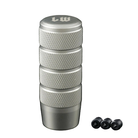 Stack of metallic cylindrical objects with textured surface and 'LW' branding