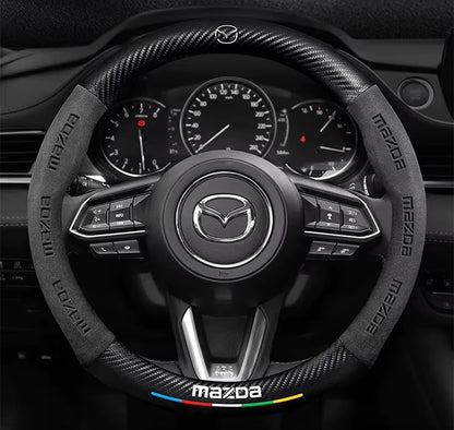 Mazda steering wheel with dashboard in the background