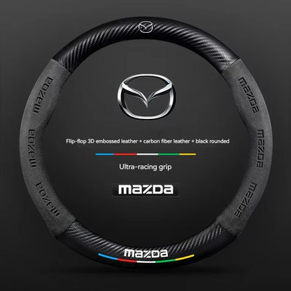 Mazda steering wheel cover with carbon fiber texture on a dark background