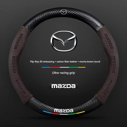 Mazda steering wheel cover with carbon fiber texture on a dark background
