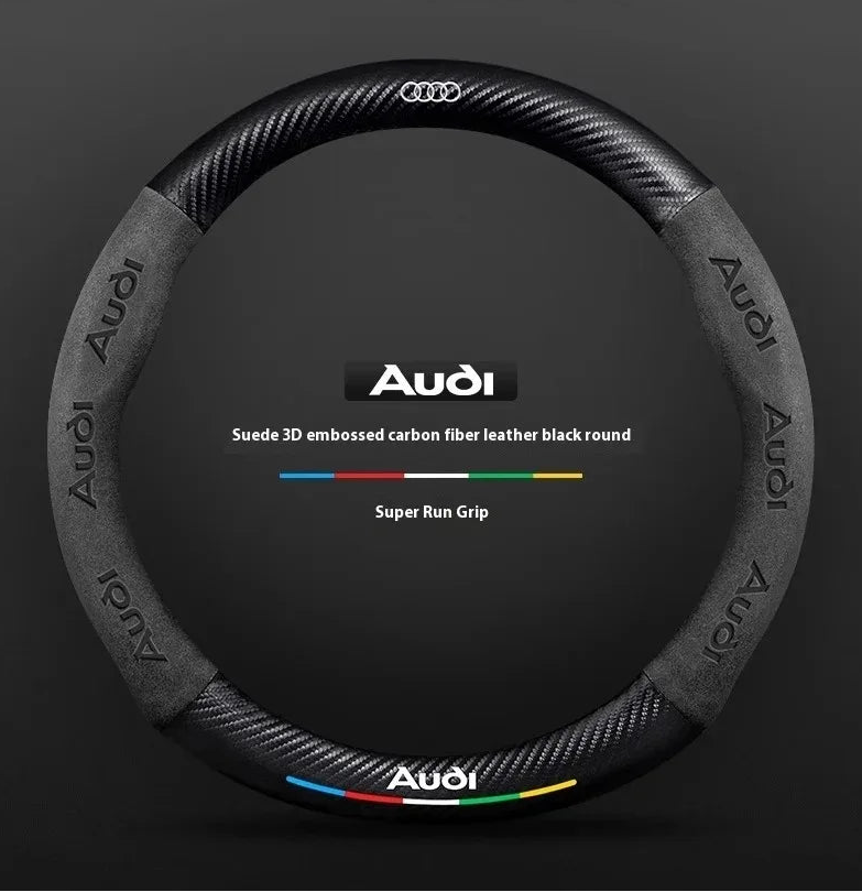 Audi steering wheel cover with carbon fiber texture on a dark background