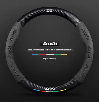 Audi steering wheel cover with carbon fiber texture on a dark background