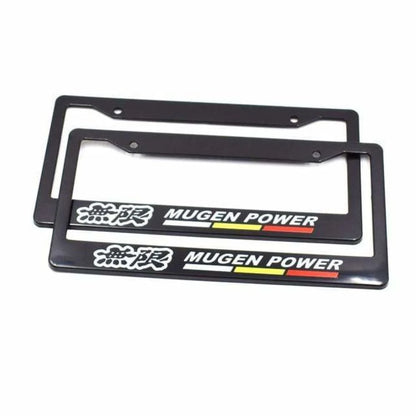 Two black licence plate frames with 'MUGEN POWER' text and Japanese characters, displayed on a white background.